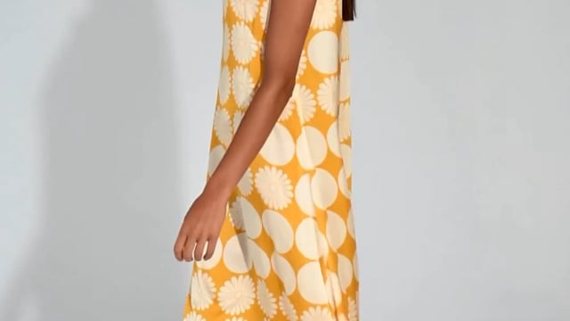 Sleevesless silk tunic in yellow daisy print